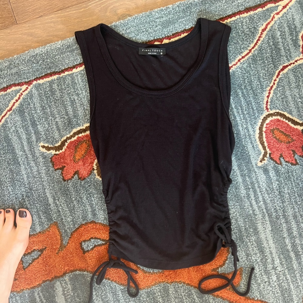 Final Touch black tank top with ties and cut outs on the side